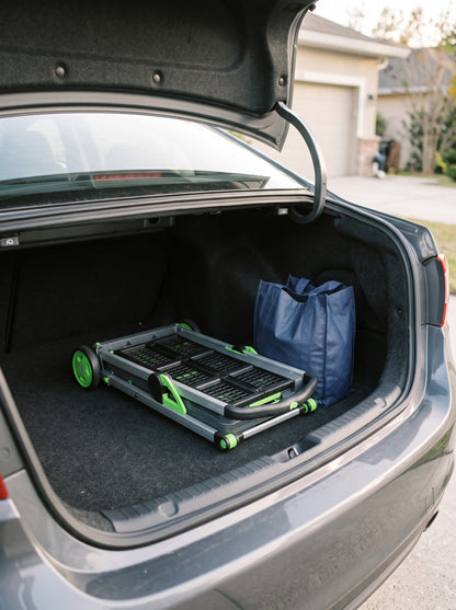 EasyRoll trolley folded flat in a sedan trunk